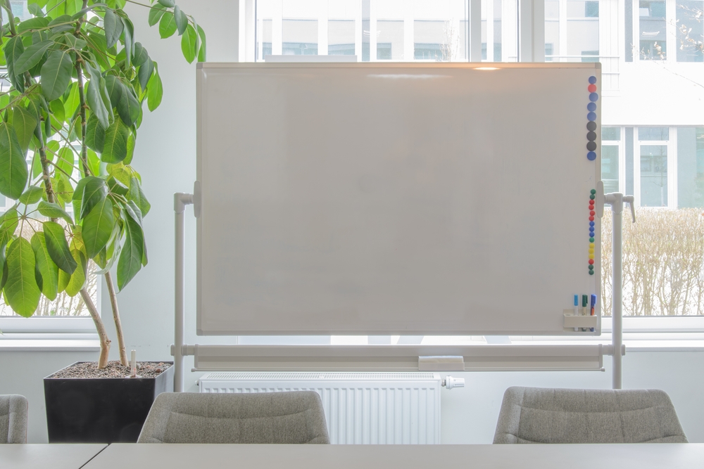Whiteboard,On,Window,Background.,Close-up.,Green,Plant